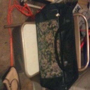 4 queens designer carrying bag